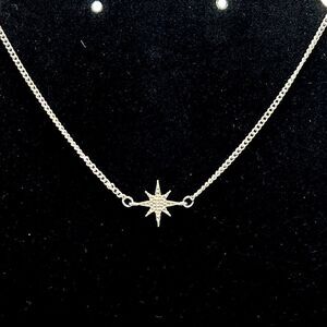 *3/$20* Silver tone rhinestone pavé starburst choker length necklace